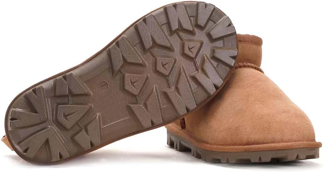 Bota de invierno para niños Kirkland Signature en color tostado